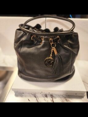 Michael Kors Black Leather Hobo Drawstring Bucket Handbag with Tassel Charm